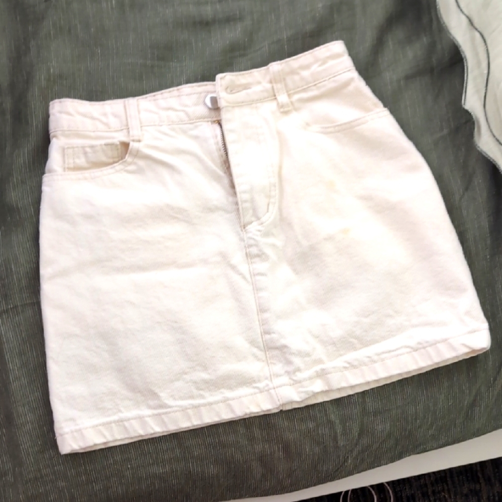 Cream colored denim miniskirt